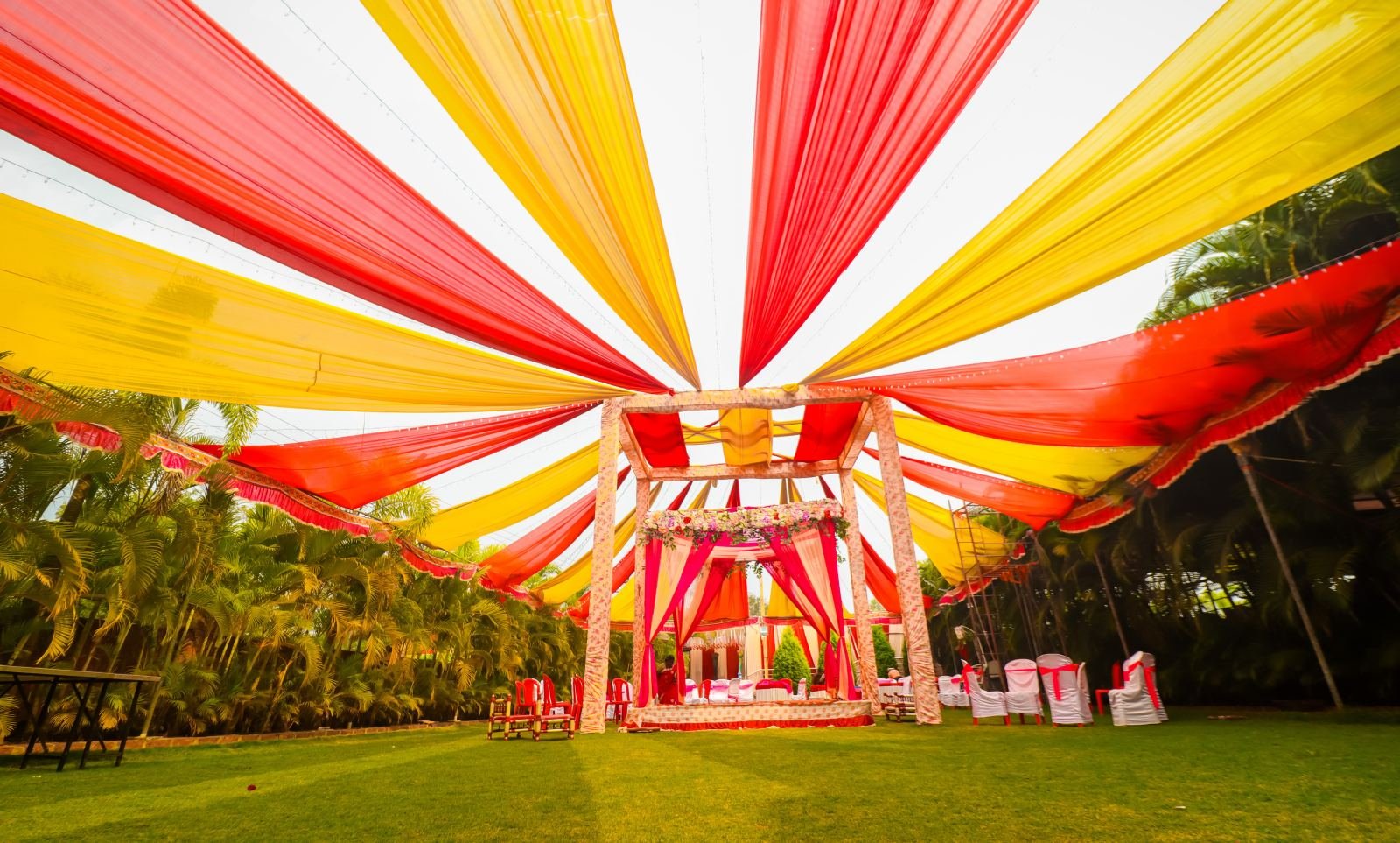 Colourful outdoor wedding mandap decoration in Ahmedabad