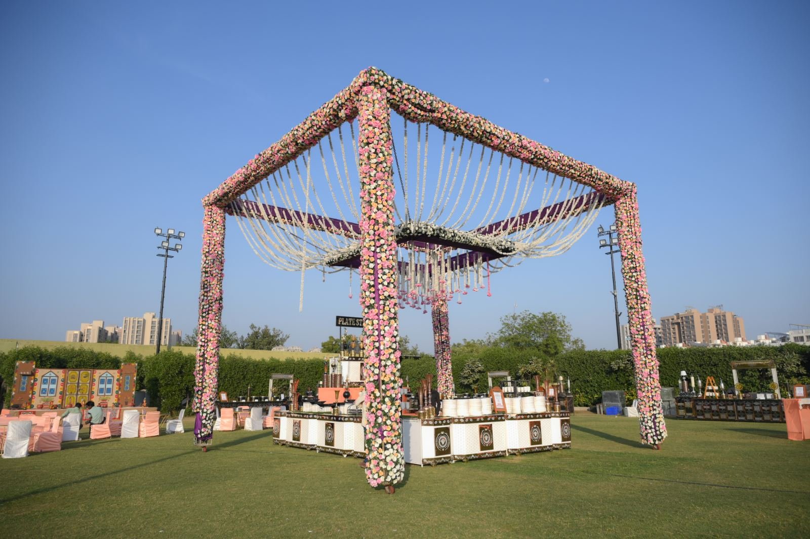 Outdoor garden wedding mandap with flowers